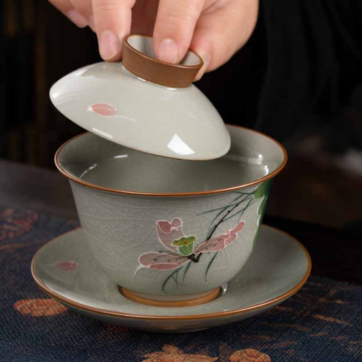 Buddha Stones Lotus Koi Fish Pod Leaf Ceramic Gaiwan Sancai Tazza da tè Kung Fu Tazza da tè e piattino con coperchio 140ml