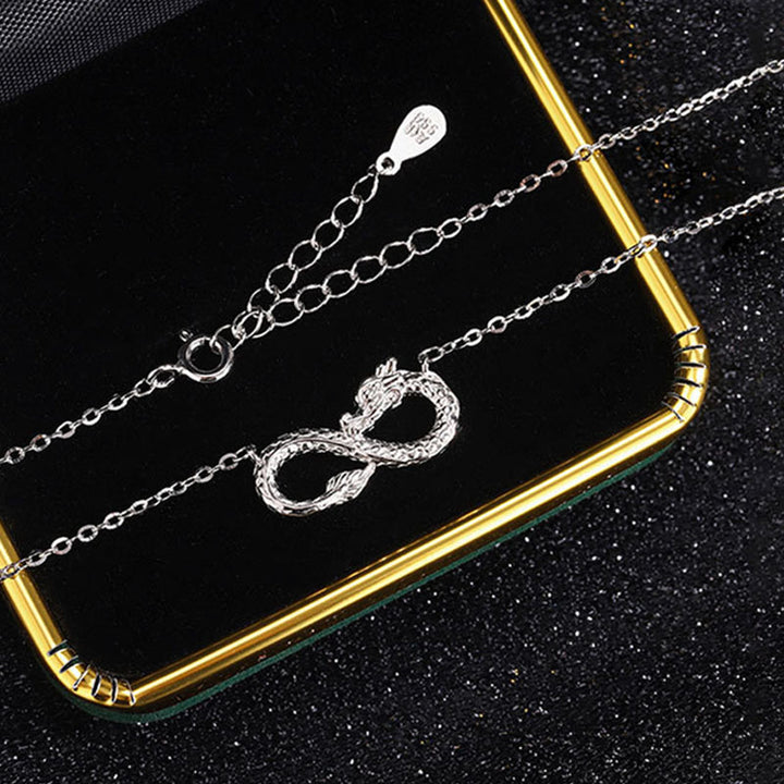 Collana con ciondolo a forma di nodo infinito dell'anno del drago in argento sterling 999 Buddha Stones
