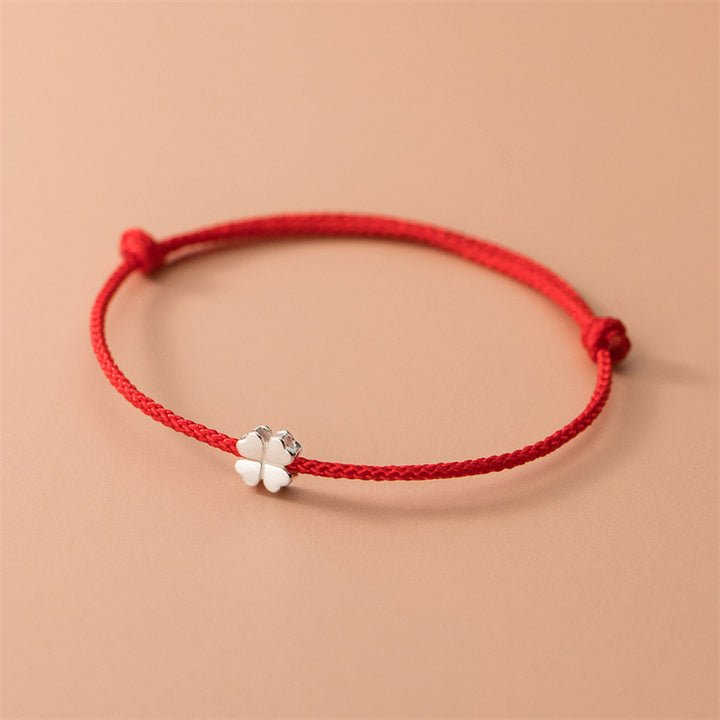 Braccialetto in corda rossa con quadrifoglio in argento sterling 925 Buddha Stones