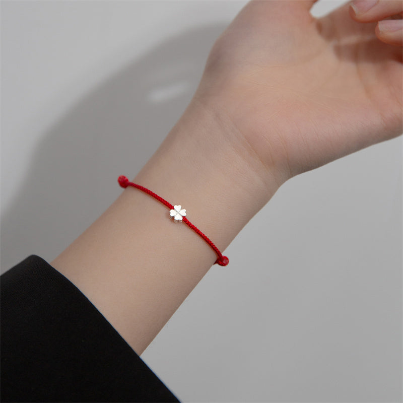 Braccialetto in corda rossa con quadrifoglio in argento sterling 925 Buddha Stones