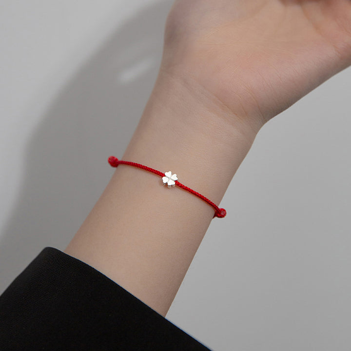 Braccialetto in corda rossa con quadrifoglio in argento sterling 925 Buddha Stones