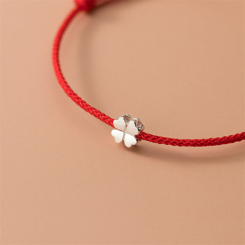 Braccialetto in corda rossa con quadrifoglio in argento sterling 925 Buddha Stones