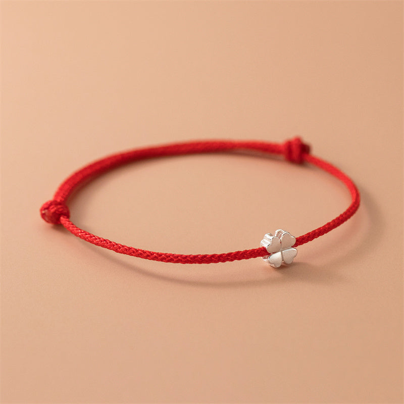Braccialetto in corda rossa con quadrifoglio in argento sterling 925 Buddha Stones