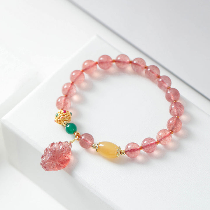 Braccialetto curativo Buddha Stones in quarzo fragola naturale con volpe a nove code