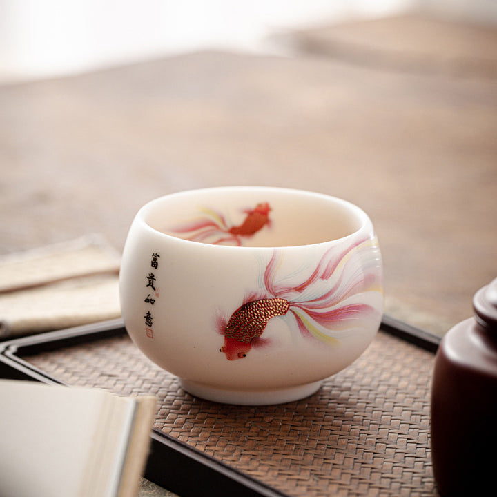 Buddha Stones Koi Fish Tazza da tè in porcellana bianca Tazza da tè in ceramica Kung Fu