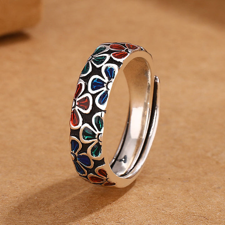 Anello regolabile in rame con design di fiori di prugna colorati Buddha Stones
