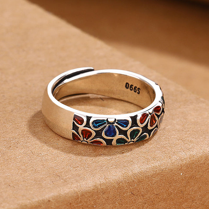 Anello regolabile in rame con design di fiori di prugna colorati Buddha Stones