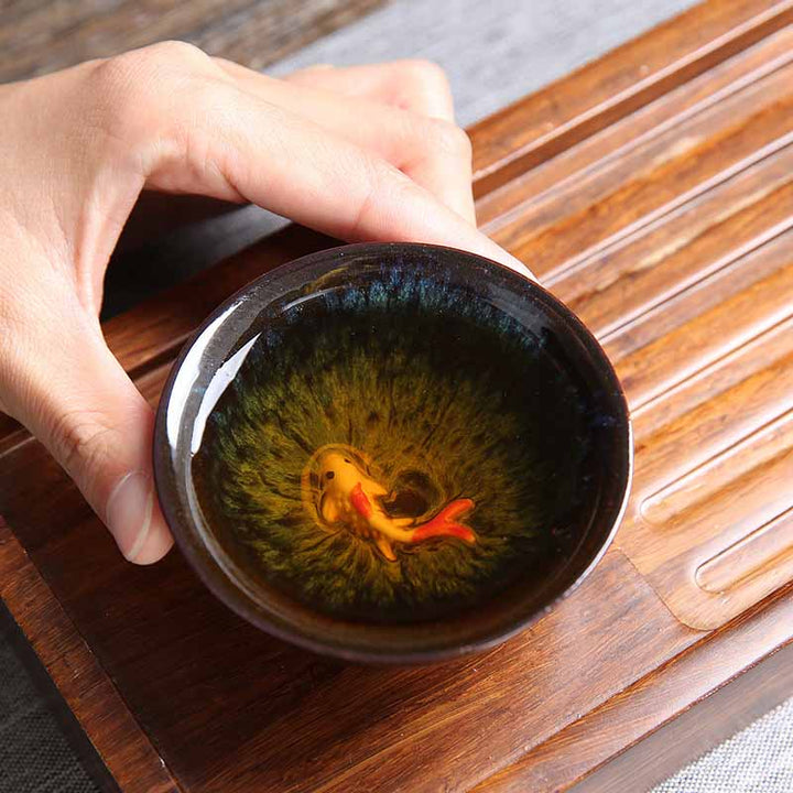 Buddha Stones Piccolo pesce Koi Blu Kiln Change Tazza da tè in ceramica cinese Jianzhan Tazza da tè Kung Fu 75 ml