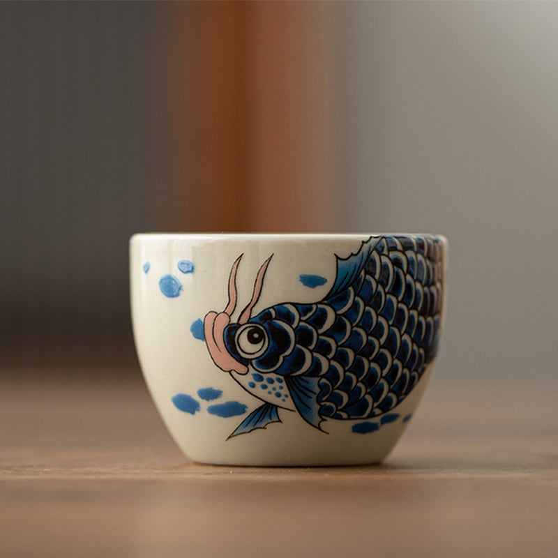 Buddha Stones Koi Fish Arowana Peonia Girasole Tazza da tè in ceramica Tazza da tè Kung Fu 60ml