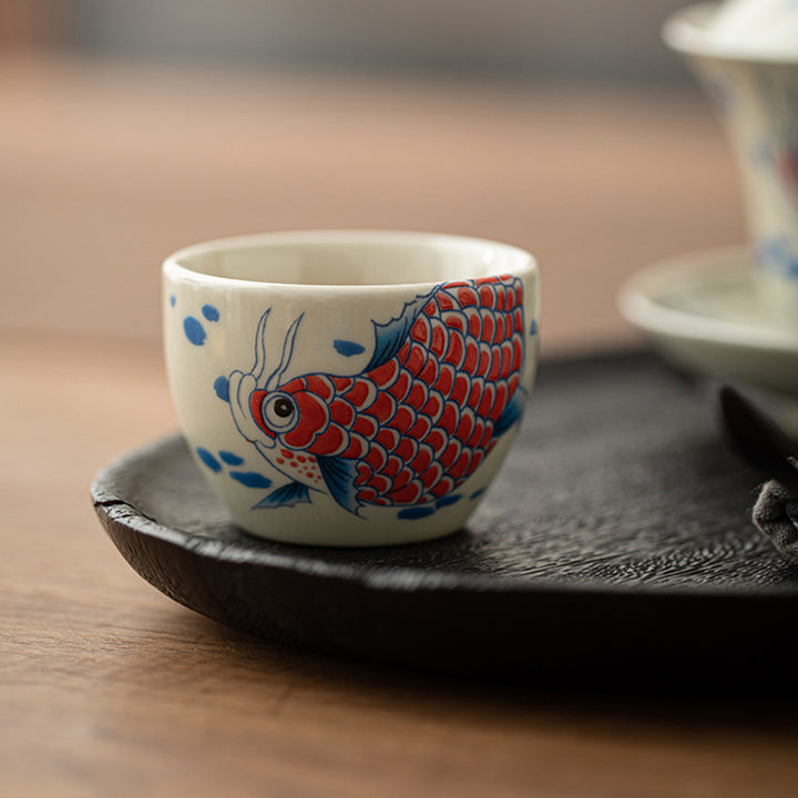 Buddha Stones Koi Fish Arowana Peonia Girasole Tazza da tè in ceramica Tazza da tè Kung Fu 60ml