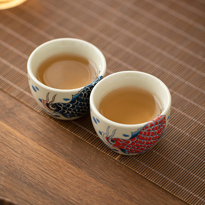 Buddha Stones Koi Fish Arowana Peonia Girasole Tazza da tè in ceramica Tazza da tè Kung Fu 60ml