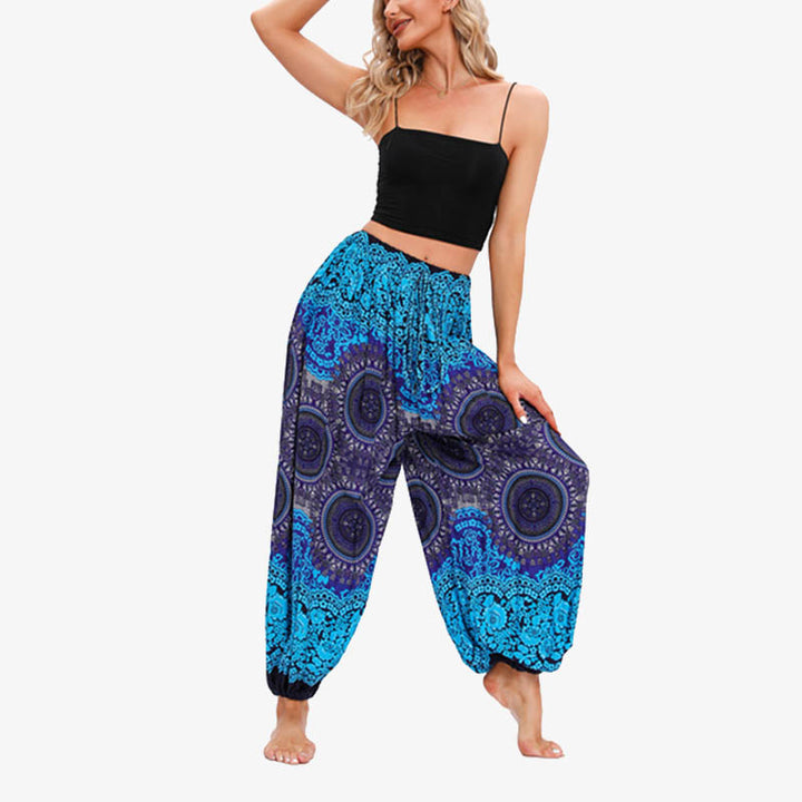 Pantaloni harem larghi da donna con fiori geometrici rotondi e Buddha Stones