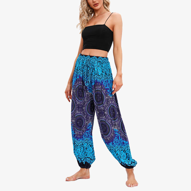 Pantaloni harem larghi da donna con fiori geometrici rotondi e Buddha Stones