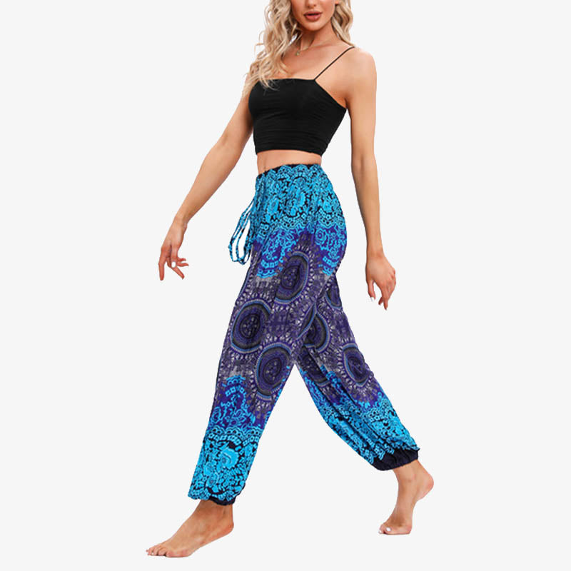 Pantaloni harem larghi da donna con fiori geometrici rotondi e Buddha Stones