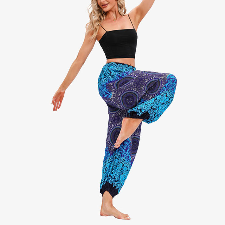 Pantaloni harem larghi da donna con fiori geometrici rotondi e Buddha Stones