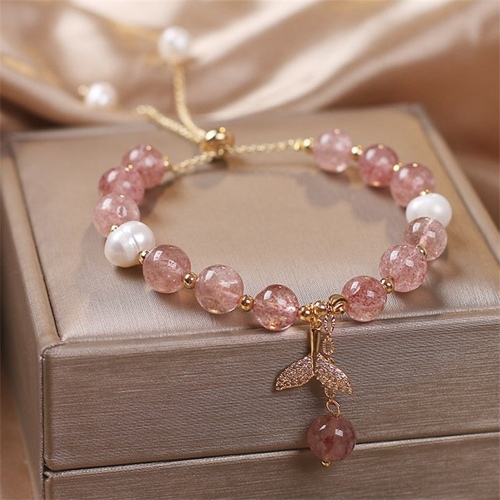 Braccialetto curativo con ciondolo a coda di pesce in quarzo rutilato e quarzo fragola Buddha Stones