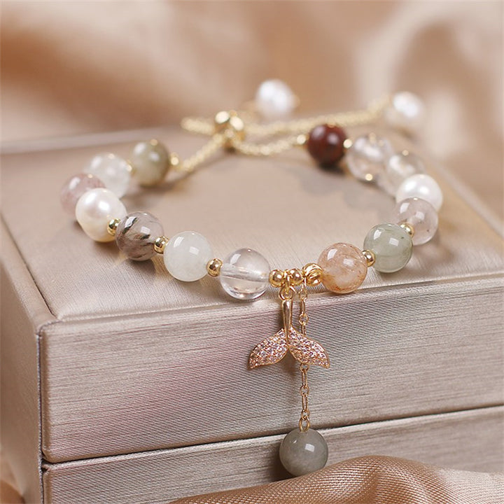 Braccialetto curativo con ciondolo a coda di pesce in quarzo rutilato e quarzo fragola Buddha Stones