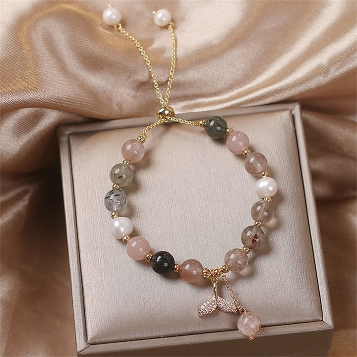 Braccialetto curativo con ciondolo a coda di pesce in quarzo rutilato e quarzo fragola Buddha Stones