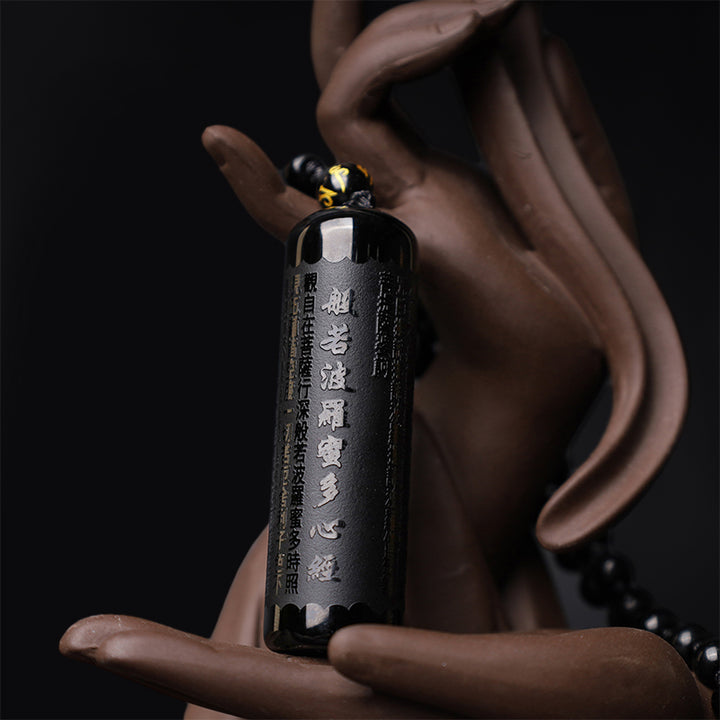 Collana con ciondolo di purificazione del Sutra del cuore in ossidiana nera naturale Buddha Stones