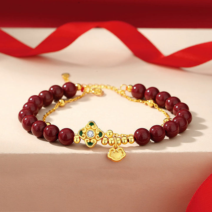 Bracciale a catena con fiore a quadrifoglio e cinabro naturale in argento sterling 925 con Buddha Stones