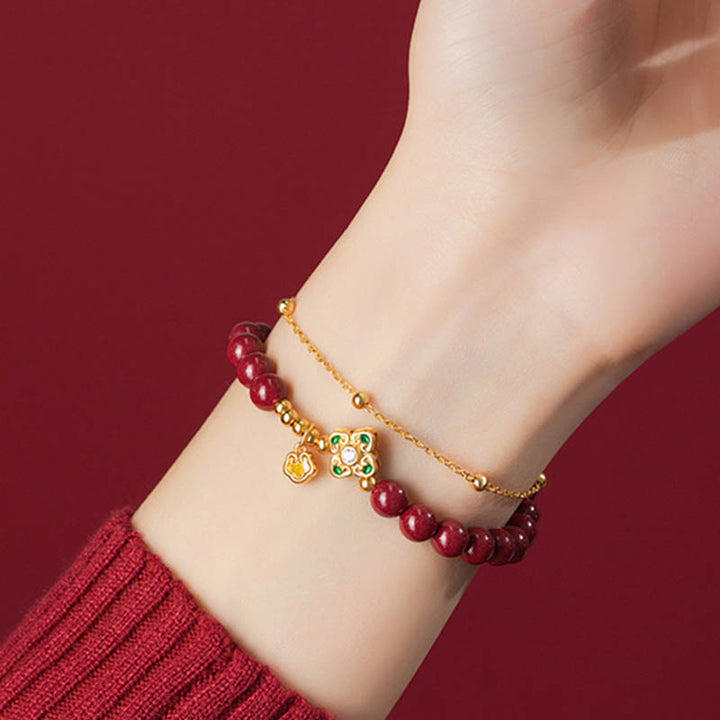 Bracciale a catena con fiore a quadrifoglio e cinabro naturale in argento sterling 925 con Buddha Stones