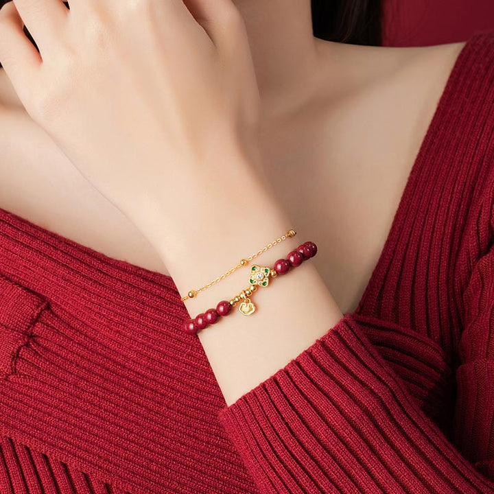 Bracciale a catena con fiore a quadrifoglio e cinabro naturale in argento sterling 925 con Buddha Stones