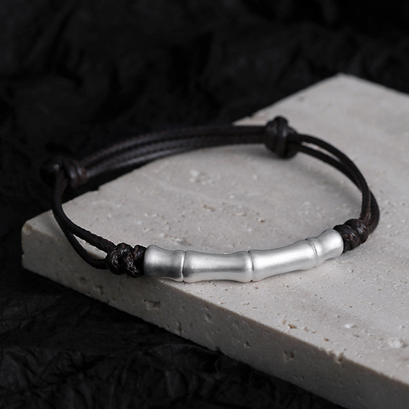 Braccialetto intrecciato con corda portafortuna a motivo osseo in argento sterling 999 Buddha Stones