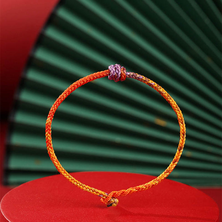 Braccialetto in corda intrecciata rossa e viola con Buddha Stones, fatto a mano