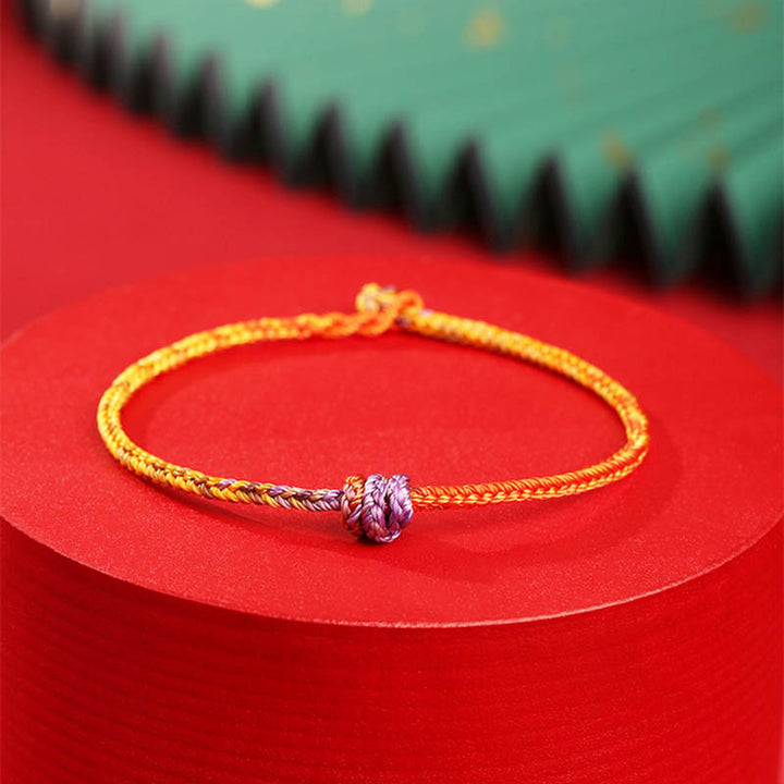 Braccialetto in corda intrecciata rossa e viola con Buddha Stones, fatto a mano