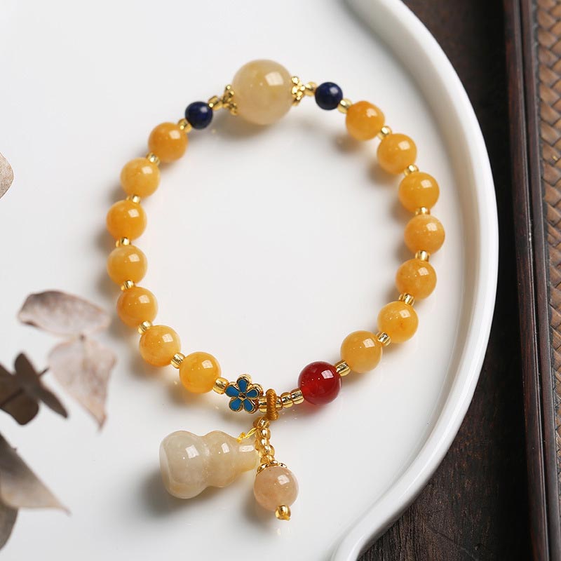 Braccialetto di fortuna e ricchezza con ciondolo di zucca in giada di seta dorata naturale Buddha Stones