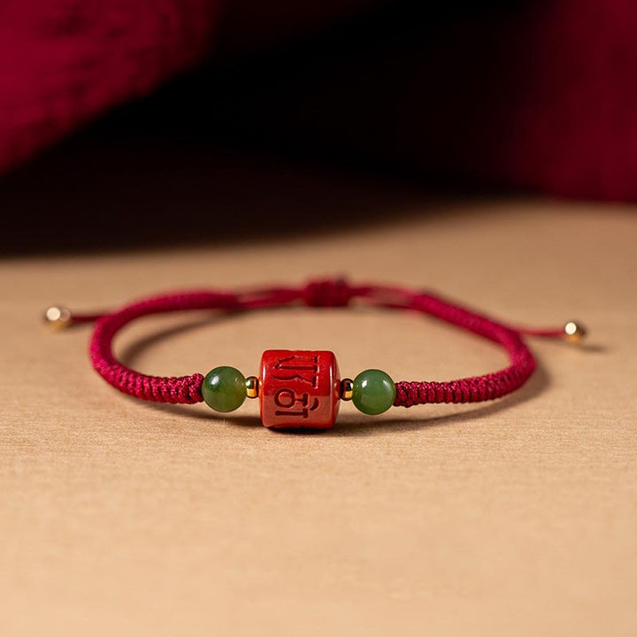 Buddha Stones Tibetam Cinnabar Om Mani Padme Hum Braccialetto di corda intrecciata con incisione di benedizione