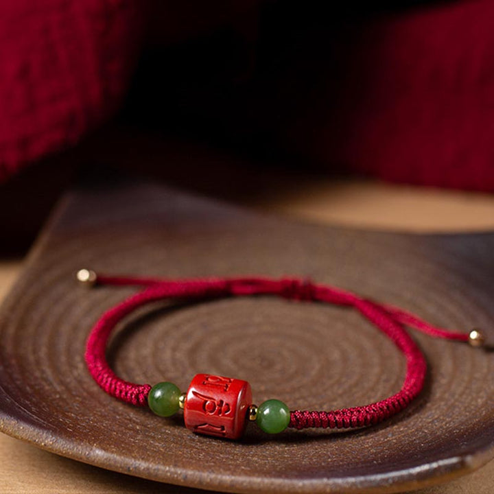 Buddha Stones Tibetam Cinnabar Om Mani Padme Hum Braccialetto di corda intrecciata con incisione di benedizione