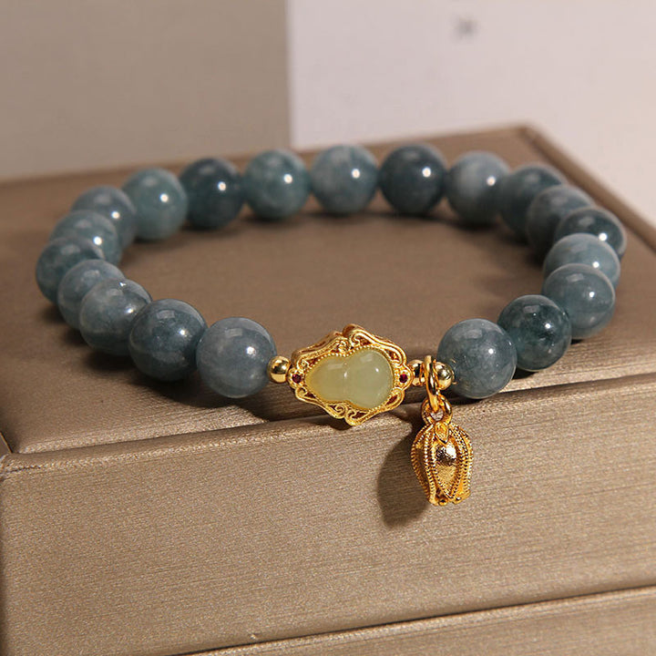 Braccialetto portafortuna con ciondolo tulipano zucca giada naturale Buddha Stones