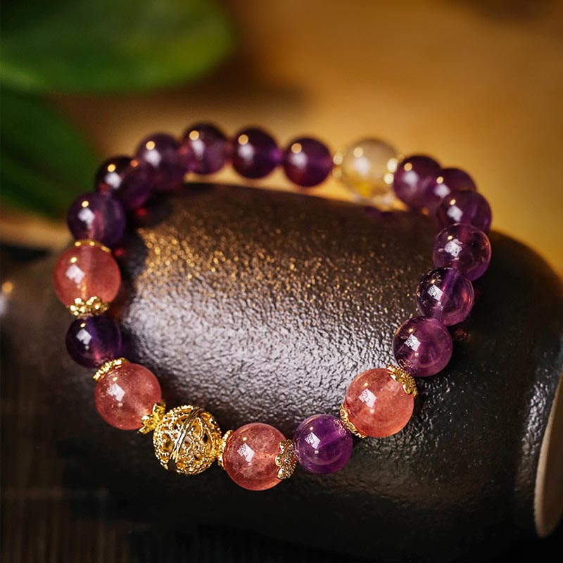 Braccialetto di protezione della prosperità in quarzo rutilato, ametista e citrino naturale Buddha Stones