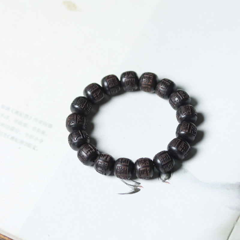 Braccialetto di equilibrio inciso in legno di Buddha Stones tibetano Om Mani Padme Hum