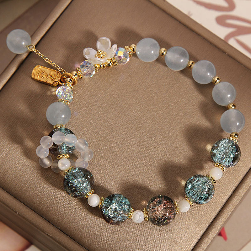 Braccialetto di guarigione naturale con fiore di calcedonio, ametista e cristallo blu Buddha Stones