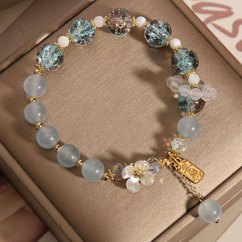 Braccialetto di guarigione naturale con fiore di calcedonio, ametista e cristallo blu Buddha Stones