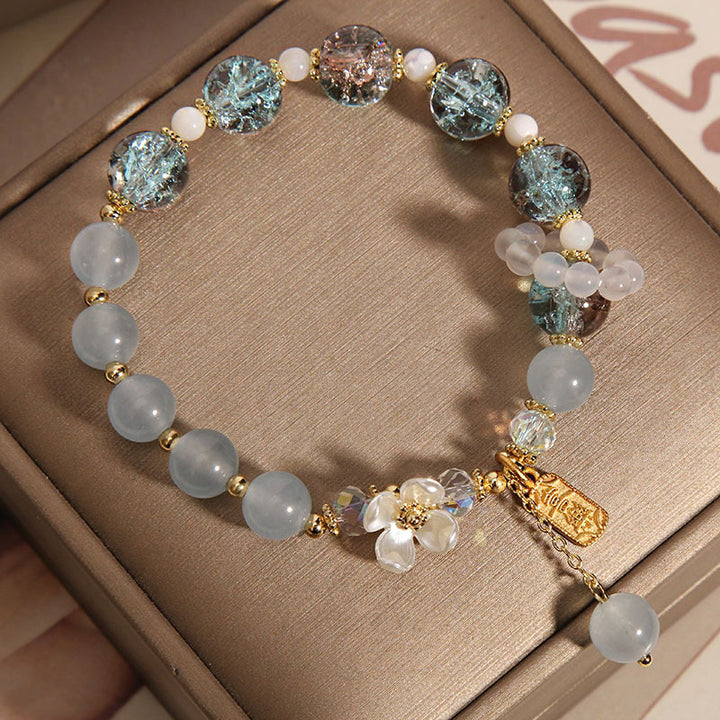 Braccialetto di guarigione naturale con fiore di calcedonio, ametista e cristallo blu Buddha Stones