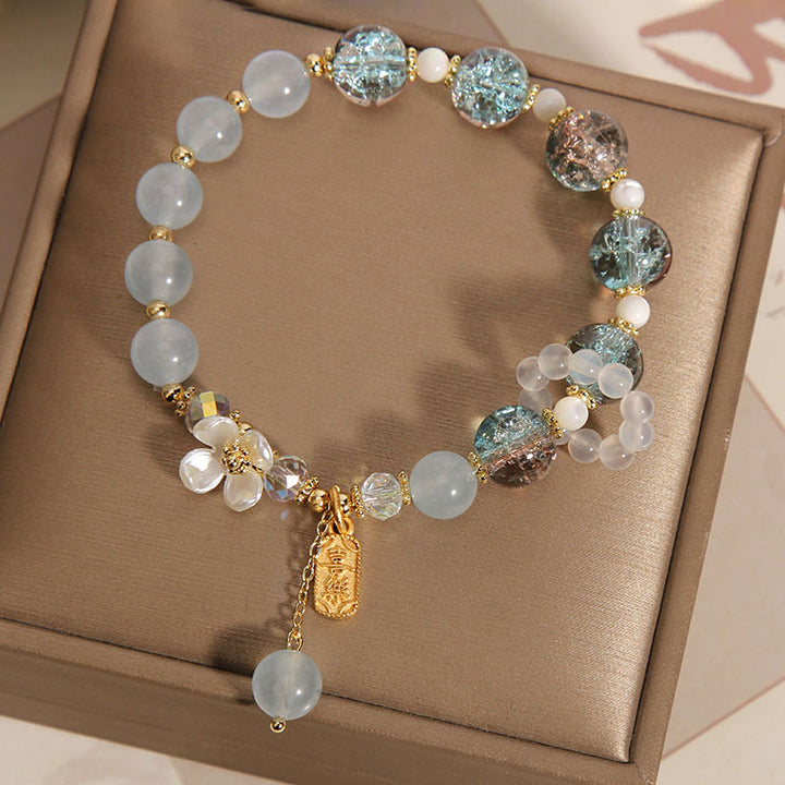 Braccialetto di guarigione naturale con fiore di calcedonio, ametista e cristallo blu Buddha Stones