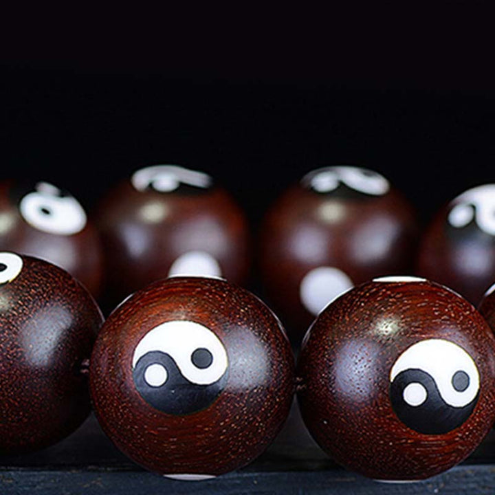 Braccialetto di protezione Yin Yang con piccola foglia di sandalo rosso Buddha Stones