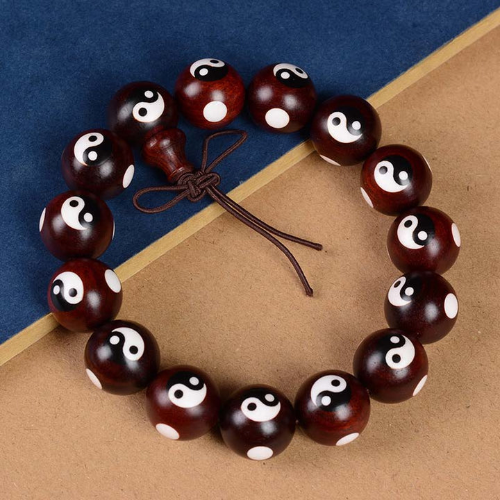 Braccialetto di protezione Yin Yang con piccola foglia di sandalo rosso Buddha Stones