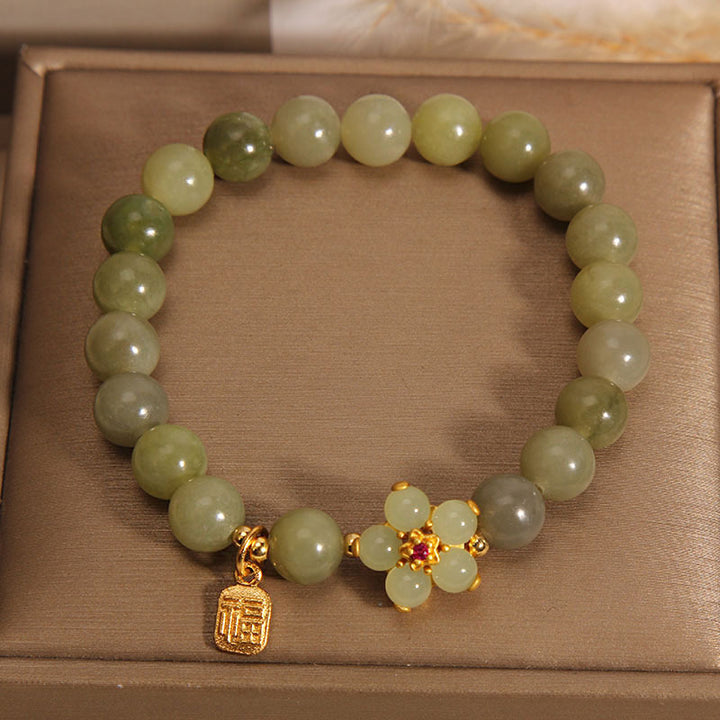 Braccialetto portafortuna con ciondolo a forma di carattere Fu con fiore di giada verde Buddha Stones