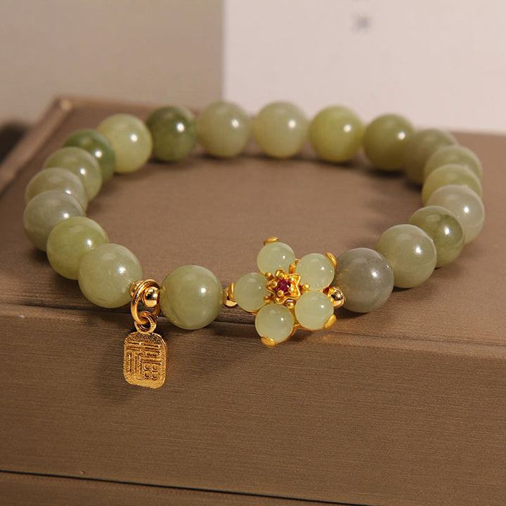 Braccialetto portafortuna con ciondolo a forma di carattere Fu con fiore di giada verde Buddha Stones