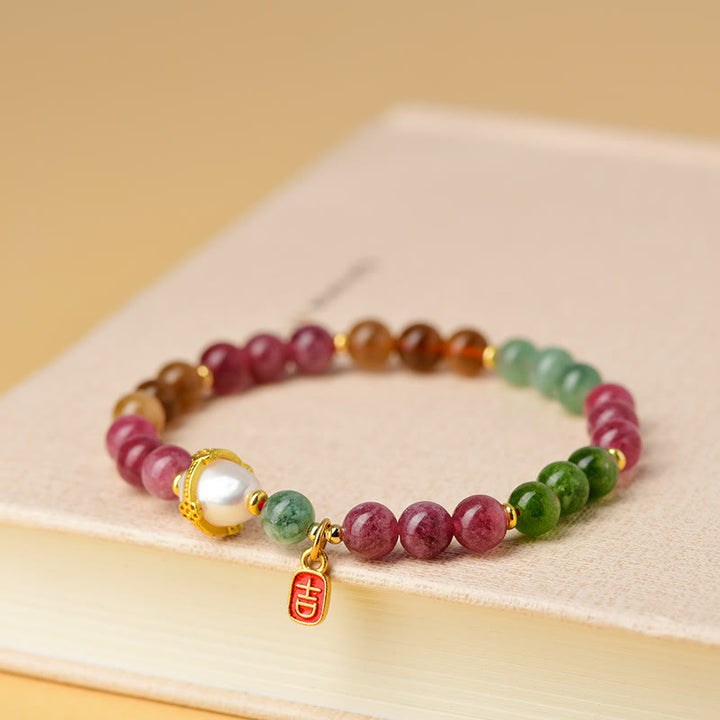 Braccialetto con ciondolo di carattere propizio e saggezza, in perle di tormalina multicolore naturale Buddha Stones