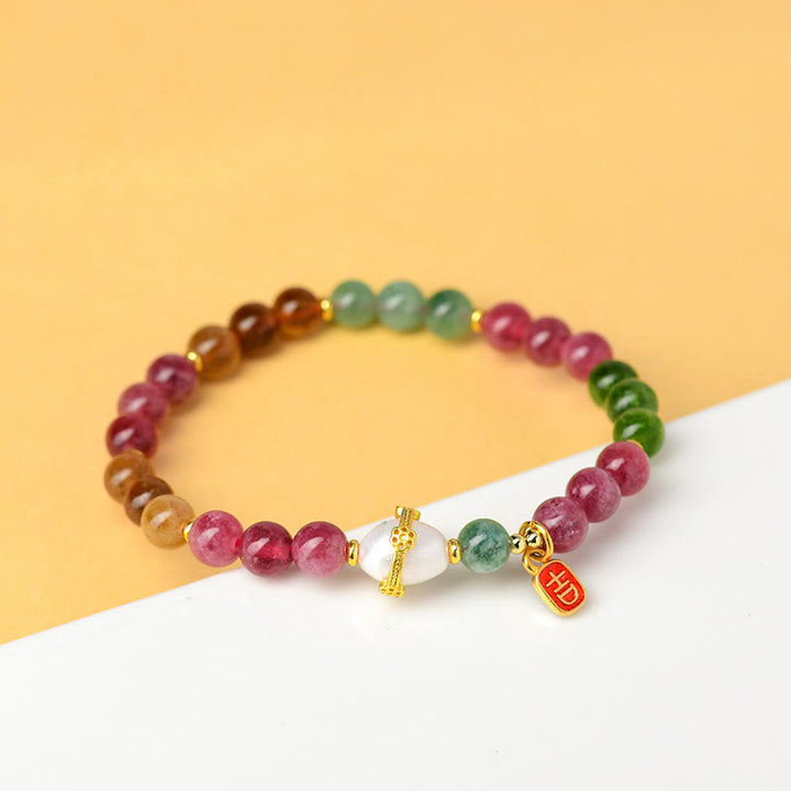 Braccialetto con ciondolo di carattere propizio e saggezza, in perle di tormalina multicolore naturale Buddha Stones