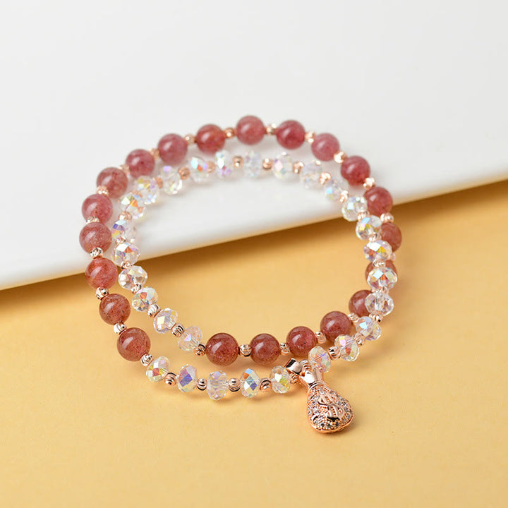 Braccialetto positivo con ciondolo a forma di borsa per soldi in cristallo bianco e quarzo fragola Buddha Stones