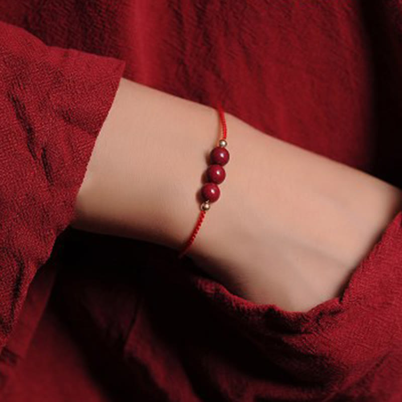 Bracciale intrecciato con corda di benedizione in cinabro naturale placcato oro 14K Buddha Stones
