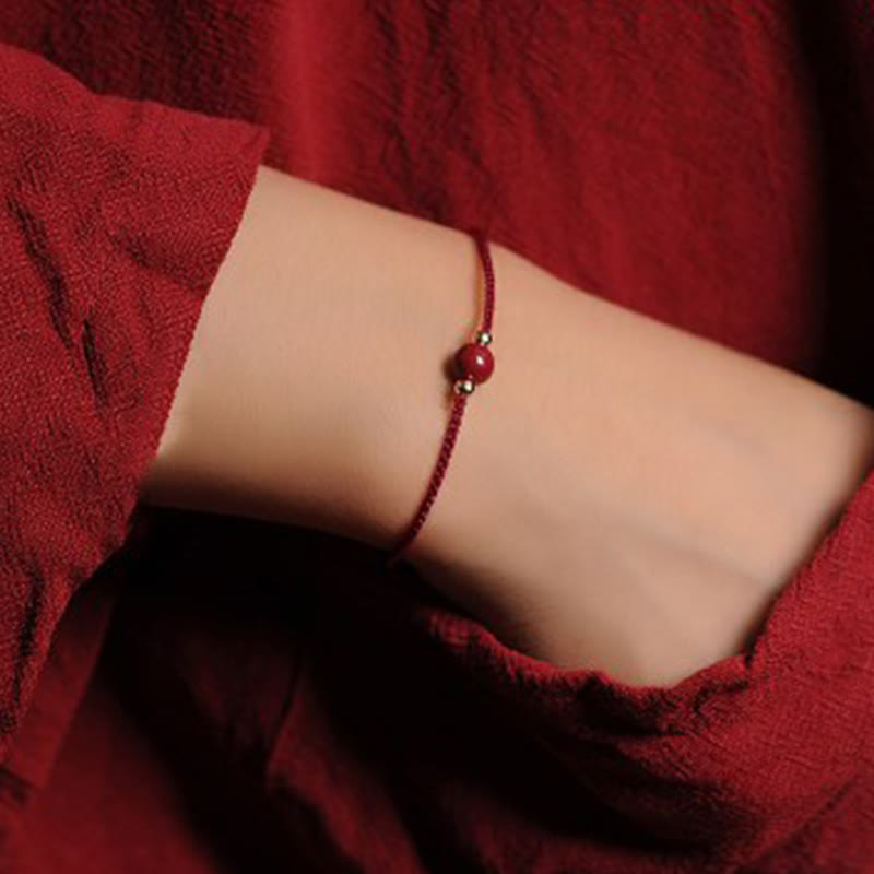 Bracciale intrecciato con corda di benedizione in cinabro naturale placcato oro 14K Buddha Stones