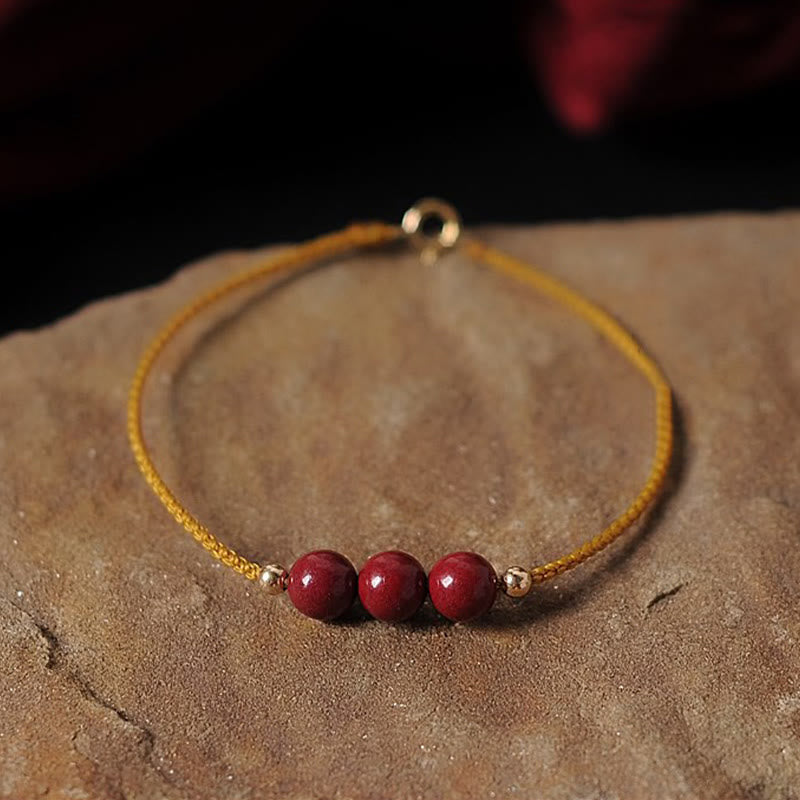 Bracciale intrecciato con corda di benedizione in cinabro naturale placcato oro 14K Buddha Stones