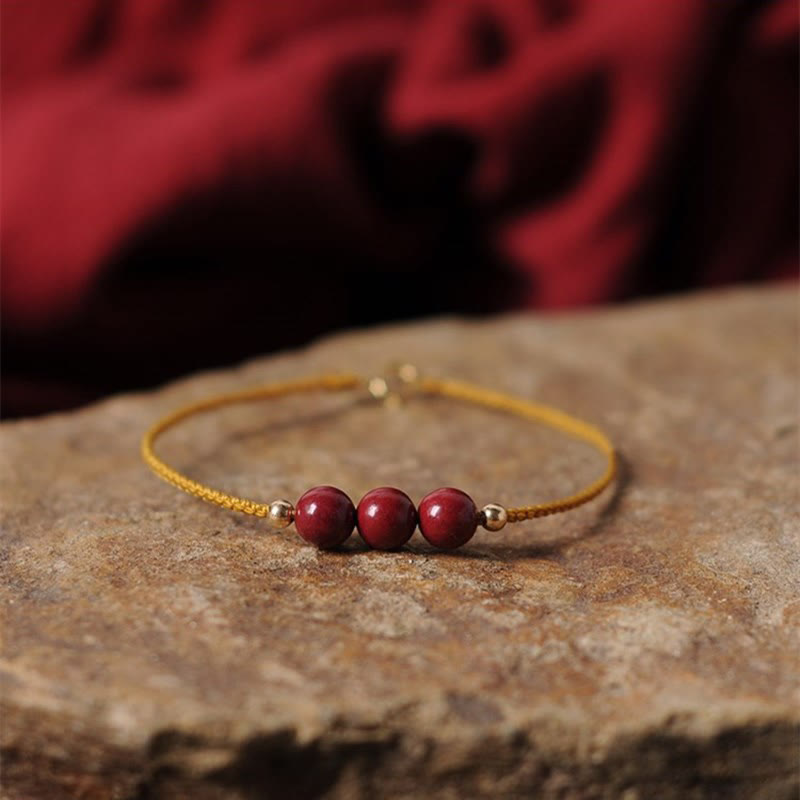 Bracciale intrecciato con corda di benedizione in cinabro naturale placcato oro 14K Buddha Stones